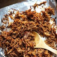 Super Easy Crockpot Shredded Pork - and a trick for getting those deliciously golden crispy bits! | pinchofyum.com