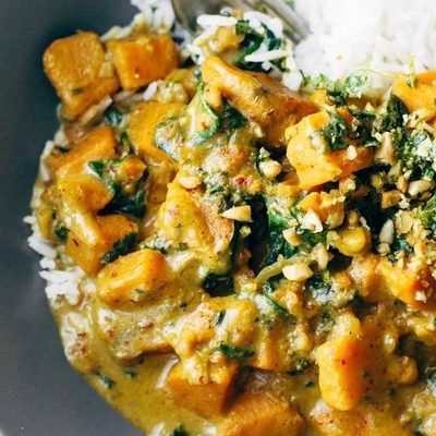 Sweet Potato Curry in a bowl with rice.